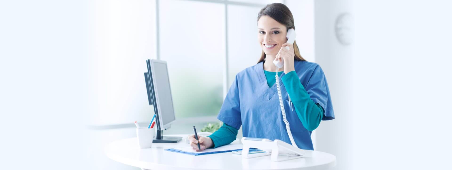  Female doctor at the reception desk