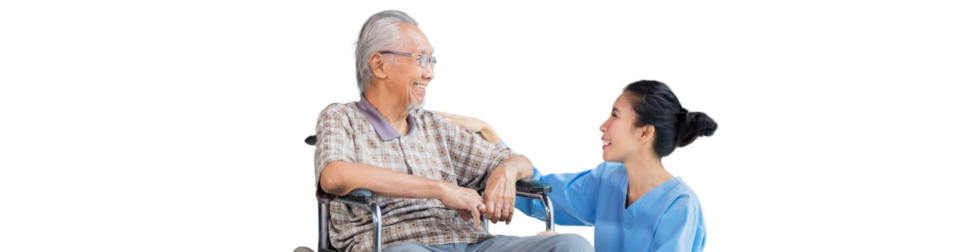 men sitting on wheelchair while talking and smiling with his nurse